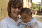 Michelle Mays, KSB/MA '08, with a friend